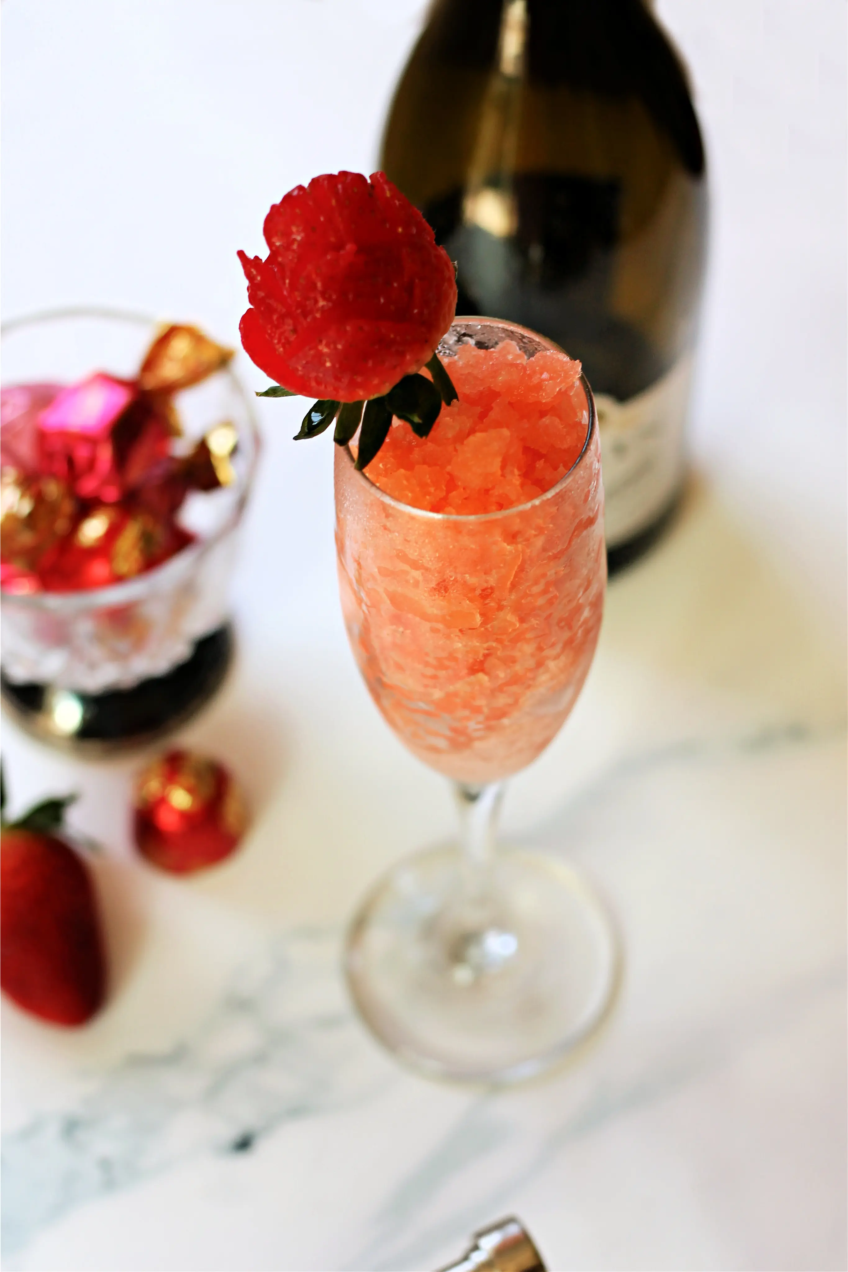 Close up of Strawberry & Champagne Granita in a champagne flute.