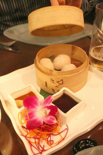 Steamed Shrimp Dumplings at Echo Restaurant, Palm Beach. Served with Spicy Mustard & Sriracha and Soy Sauce