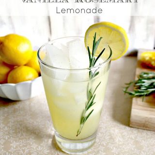 Vanilla-Rosemary Lemonade! This fresh lemonade recipe gets a flavor upgrade with the addition of real vanilla bean and fragrant rosemary. A perfect sipper for showers, parties and summertime porch sittin'!