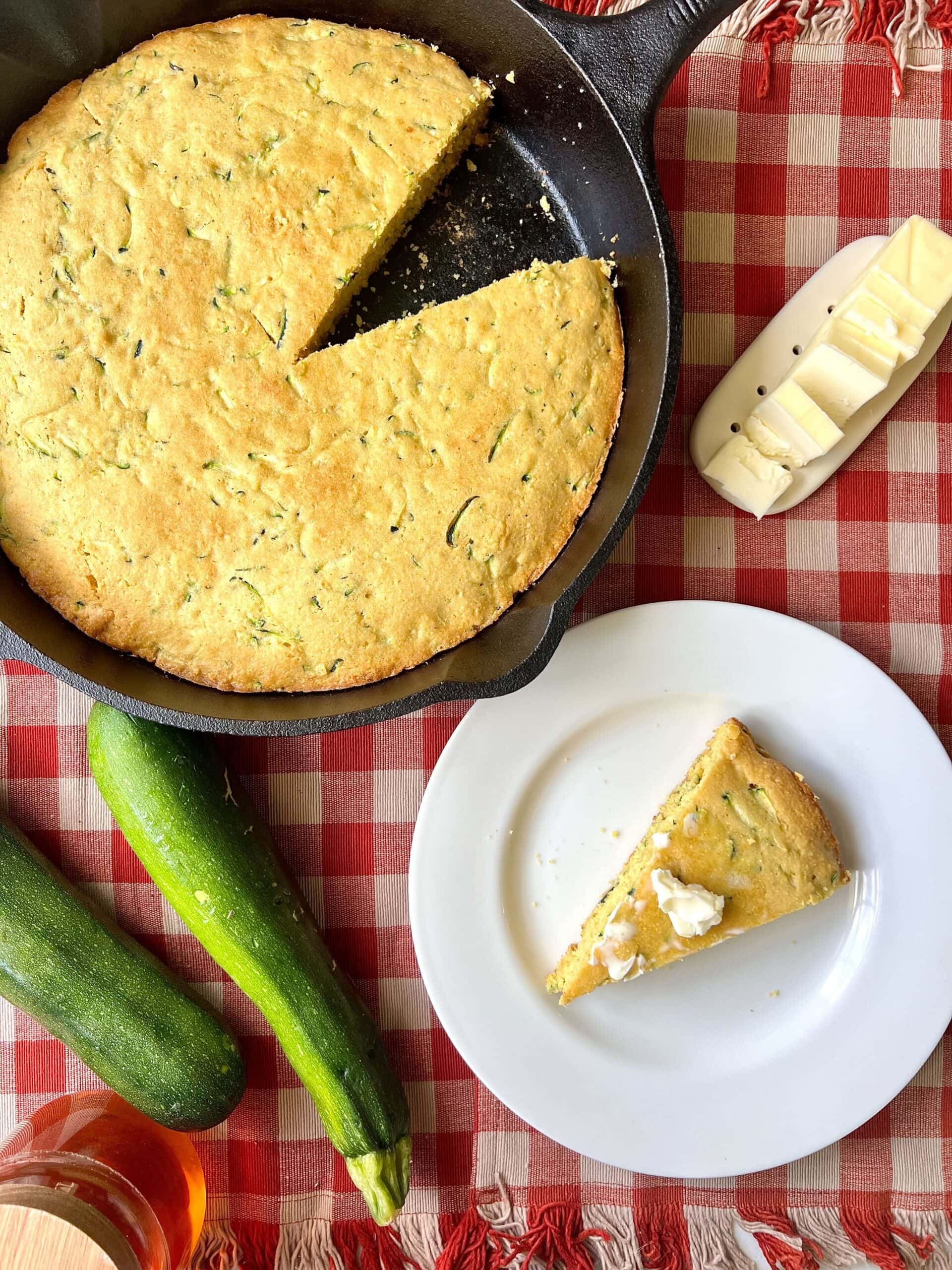 Brown Butter Zucchini Cornbread in a cast iron skillet.