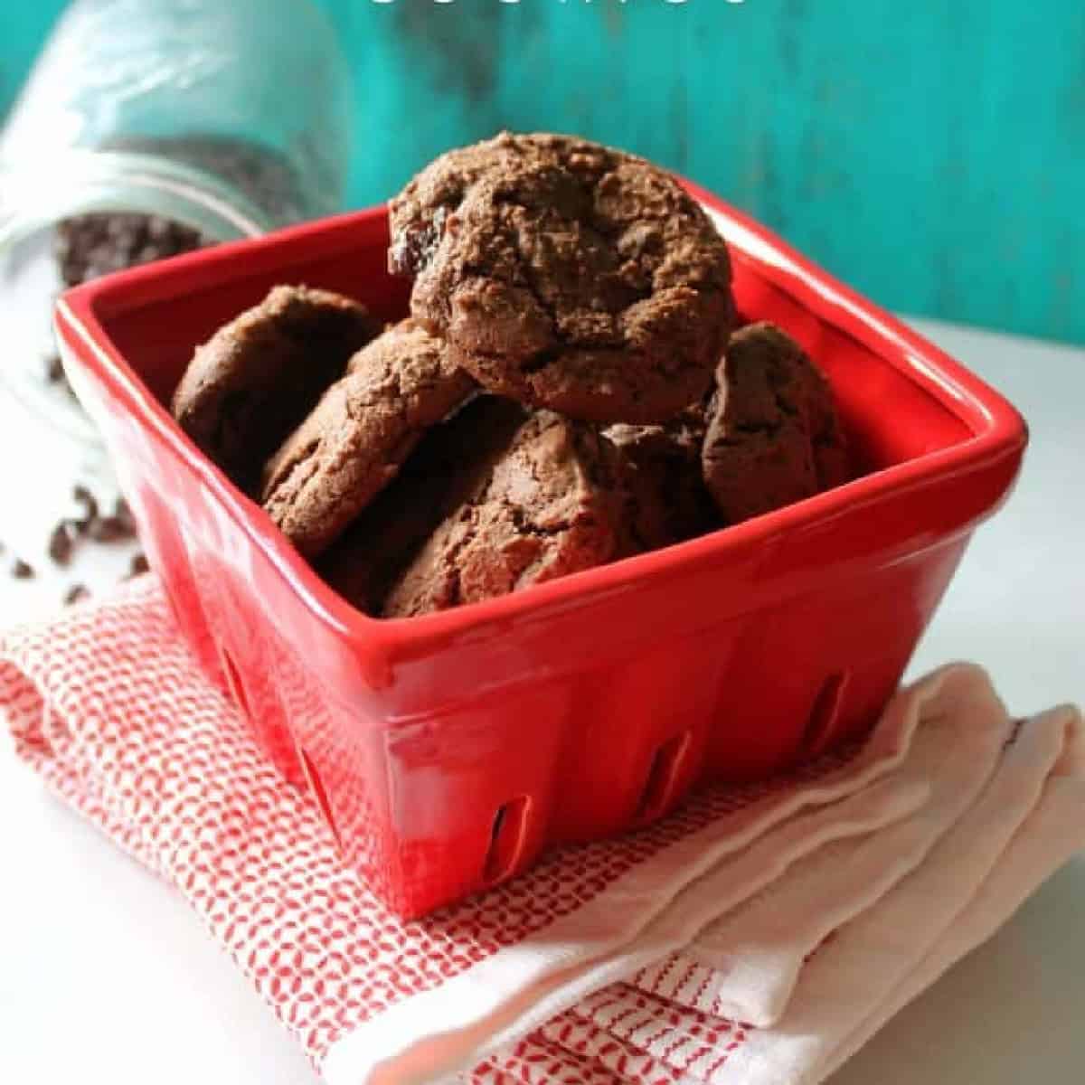 Chocolate Cherry Cookies in a red ceramic berry basket.