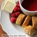 White Chocolate Almond Rugelach with Vanilla Raspberry Sauce