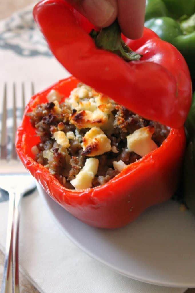 Mediterranean Turkey Stuffed Peppers! Spiced ground turkey and feta cheese are stuffed inside a bell pepper & baked for an easy, crowd-pleasing meal or side dish that's always welcome!