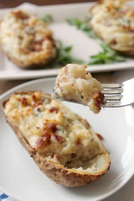 Closeup of a forkful of Blue Cheese & Bacon Twice Baked Potatoes.