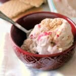 Strawberry Cheesecake Ice Cream in a red bowl.