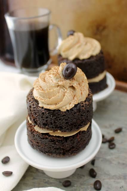 Irish Coffee Chocolate Cakes! Rich, whiskey-infused chocolate mini cakes are layered with sweet, boozy whipped cream in this beverage-inspired dessert.