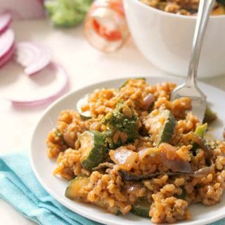 Coconut Red Curry Fried Rice is the weeknight dinner you need in your cooking repertoire! Just 7 convenient ingredients make up this filling, one-pan meal!