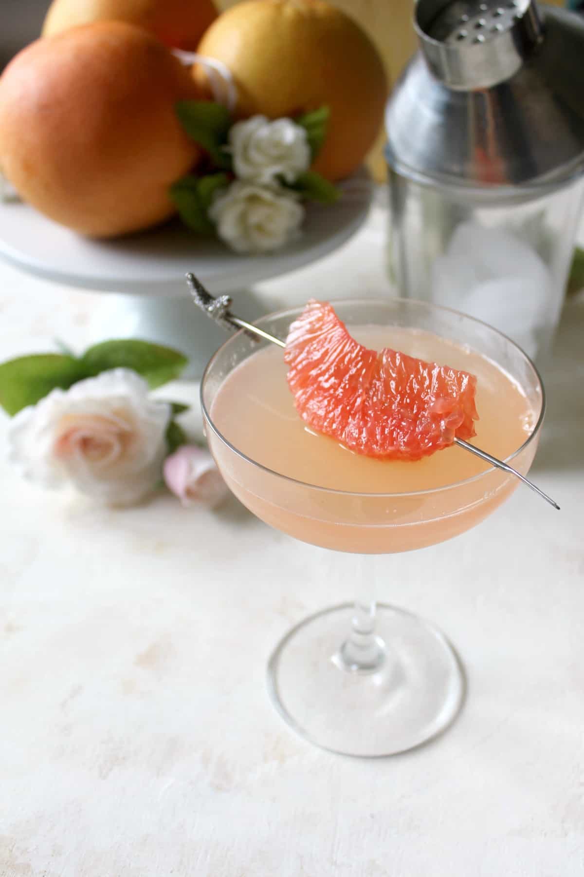 This Grapefruit Ginger Cocktail makes a refreshing elixir with a mildly spicy zing. Fresh squeezed grapefruit juice lends citrusy sweetness to the drink, while ginger beer gives the unassuming beverage effervescence and a touch of heat. Mix it up to sip on for a special celebration or a weekend treat!
