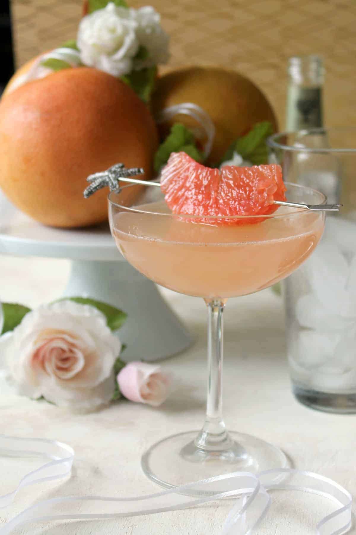 This Grapefruit Ginger Cocktail makes a refreshing elixir with a mildly spicy zing. Fresh squeezed grapefruit juice lends citrusy sweetness to the drink, while ginger beer gives the unassuming beverage effervescence and a touch of heat. Mix it up to sip on for a special celebration or a weekend treat!