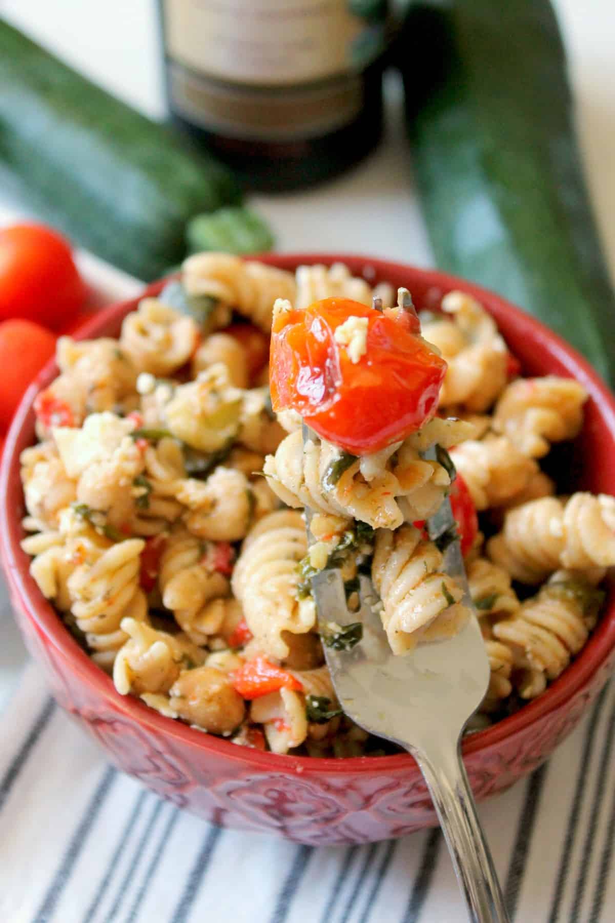 This Healthy Mediterranean Pasta Salad is filled with veggies, beans and is high in Omega-3s thanks to a flax oil dressing that pulls it all together.