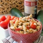 This Healthy Mediterranean Pasta Salad is filled with veggies, beans and is high in Omega-3s thanks to a flax oil dressing that pulls it all together.