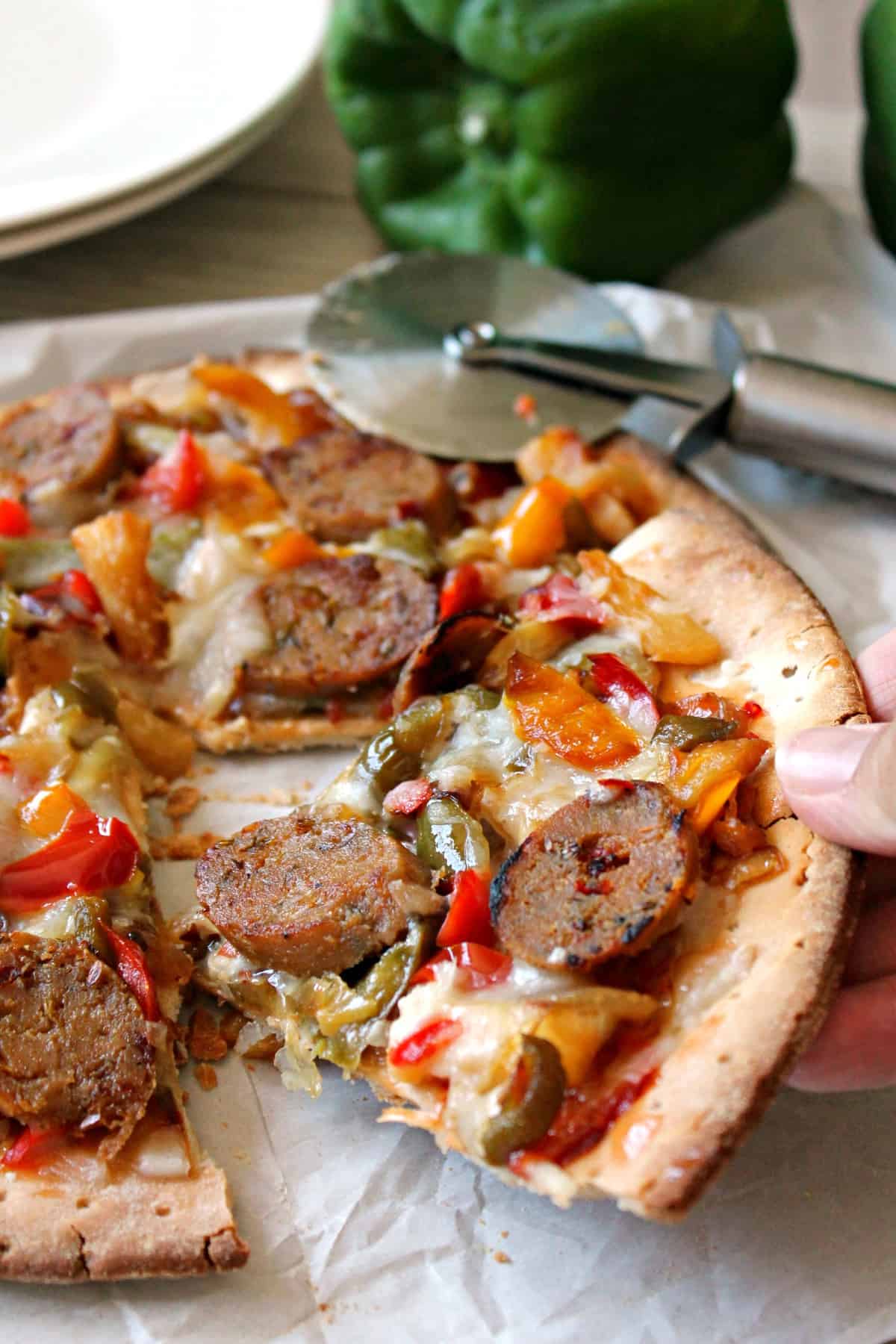 Sausage, Pineapple & Bell Pepper Flatbread. Cancel that pizza order & whip this up in no time; a colorful, sweet and spicy flatbread that will make your taste buds do a hula dance!