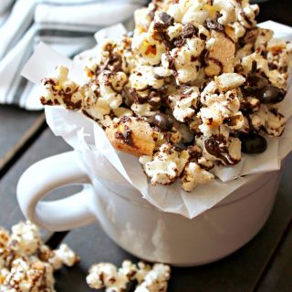 Tiramisu Popcorn! Chocolate, coffee and lady finger cookie bits infuse this popcorn treat with flavors of the classic, Italian dessert in snackable form!