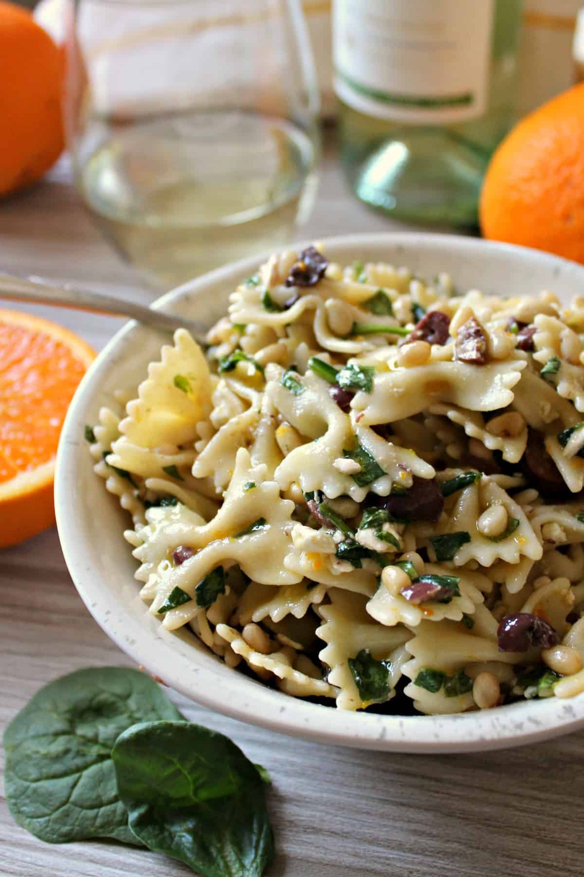 Citrusy Spinach, Olive, Feta & Pine Nut Pasta Salad is an ideal dish for laid back summer entertaining. Not only does it come together quickly, but it's also a great recipe to make ahead so you an focus on the best part of summertime: relaxing! Pair with light, refreshing Cavit Pinot Grigio for effortless elegance. 