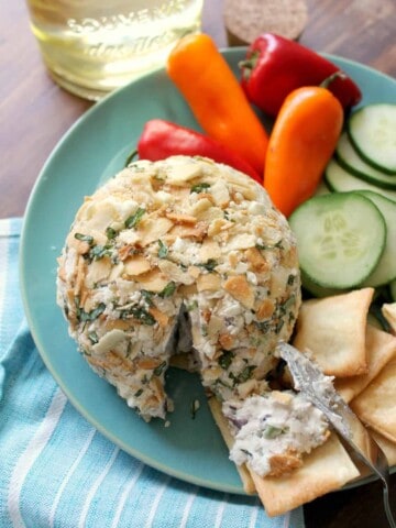 This Easy Greek-Style Cheese Ball is the only recipe you'll need this summer when it comes to quick and simple potluck contributions and last minute entertaining! Bursting with fresh, herbacious flavors that go perfectly with crisp vegetables or crackers, you might have whip up a double batch! 