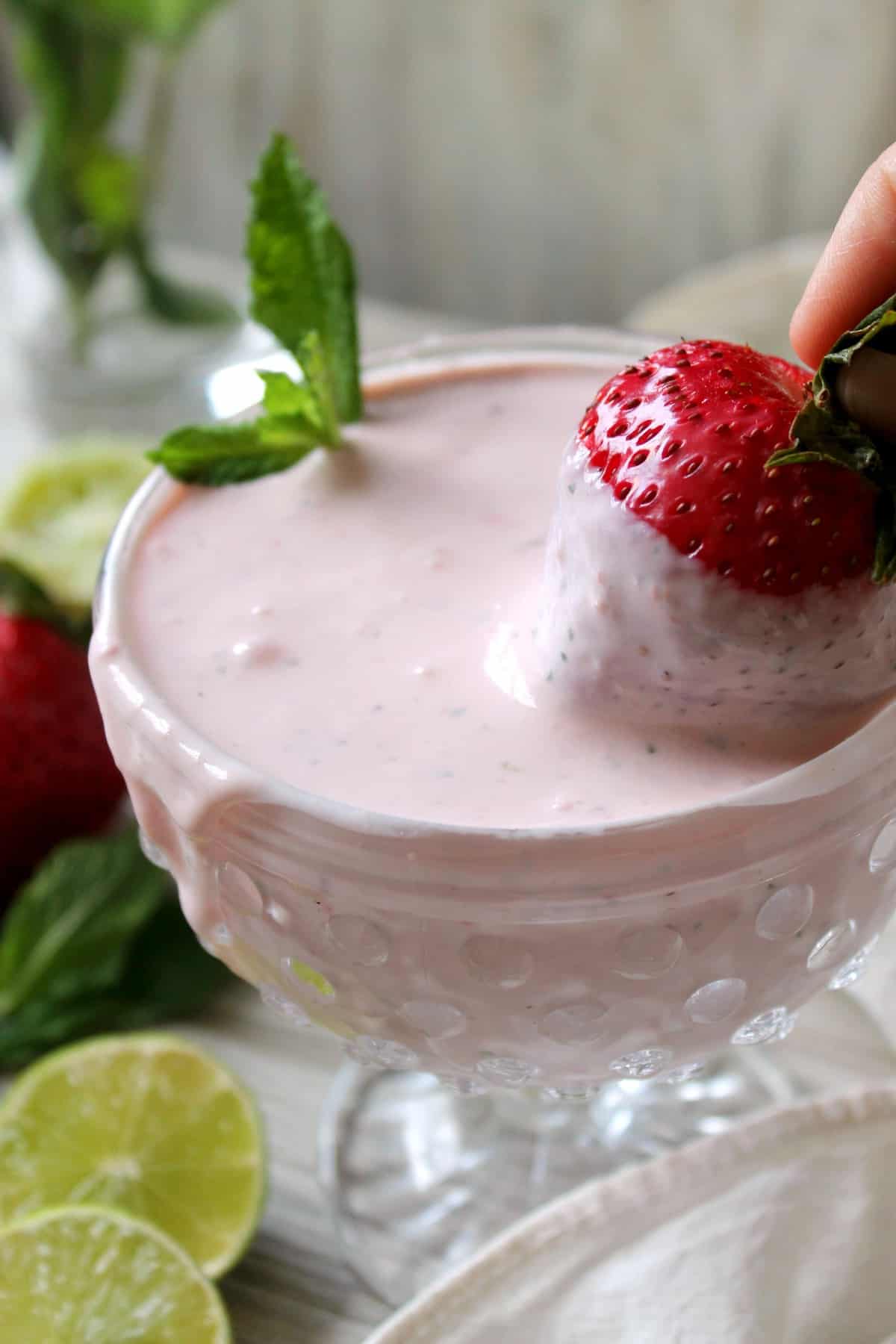 Skinny Strawberry Mojito Fruit Dip! Stay bikini-ready while you enjoy this light & luscious fruit dip that has the flavors of a fresh summer cocktail!