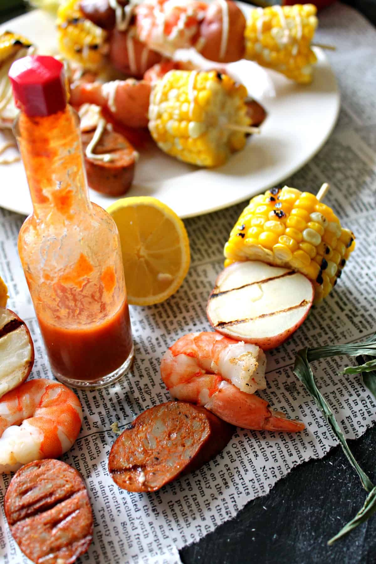 Drizzle some hot sauce on these Shrimp Boil Kabobs for some extra heat on this perfect summer meal