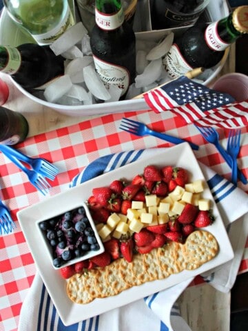 The most patriotic plate at your 4th of July block party is sure to be this Old Glory-inspired cheese plate! Beautiful enough to double as a centerpiece, but easy enough to arrange in minutes, it's a true example of summer's easygoing entertaining vibes!