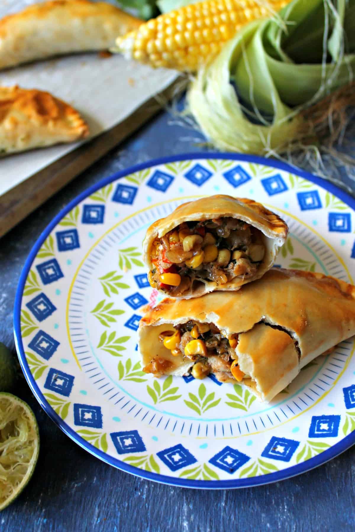 Need a new way to use up that summer sweet corn? These Baked Crab and Corn Empanadas are a handheld savory snack that's bursting with flavor and fun to eat! Baked instead of fried, they're a lightened up version of a classic Latin American bite.  