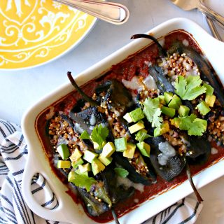 This healthier, summertime version of chiles rellenos (stuffed poblano peppers) turn up the heat AND the nutrition on a well-loved recipe. Poblano peppers are stuffed with a healthful blend of ancient grains {and a little cheese, of course!}, nestled in your favorite store-bought salsa or taco sauce and baked instead of fried, keeping things light yet satisfying for a spiced up dinner on any summer day.