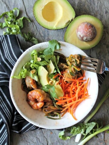 Shrimp & Avocado Zoodle Salad Bowls! Add your favorite protein to these these healthful zucchini noodle bowls for a quick weeknight meal you'll love!