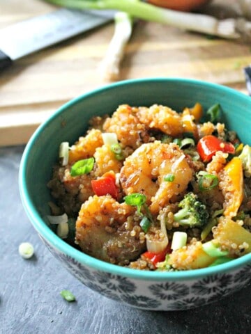 Pineapple Shrimp Quinoa Stir Fry Bowls! Minimal work and so much flavor; these sweet and spicy bowls will become your favorite healthful dish when you need a quick, nutritious dinner!