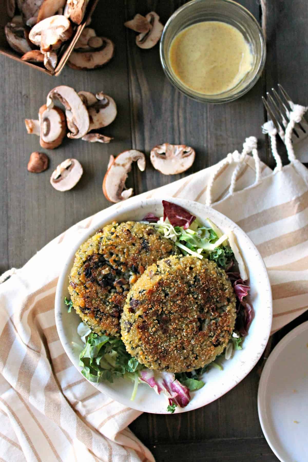Mushroom, Spinach & Swiss Brown Rice Patties! A vegetarian approach to a hearty burger; filled with earthy mushrooms, nutritious spinach, melty Swiss cheese and crisp exterior.