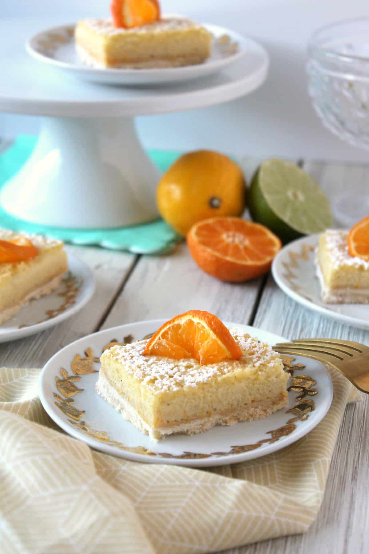 Vanilla Bean Citrus Bars! A crisp, shortbread crust is topped with a layer of sweet, citrusy filling speckled with fragrant vanilla beans. These are the stuff of potluck dreams!