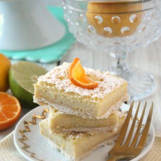 Vanilla Bean Citrus Bars! A crisp, shortbread crust is topped with a layer of sweet, citrusy filling speckled with fragrant vanilla beans. These are the stuff of potluck dreams!