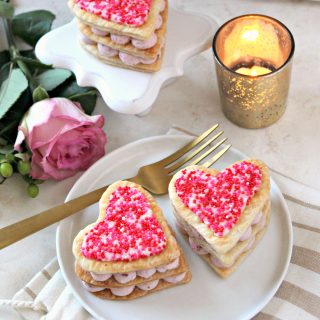 Easy Cherry Mousse Napoleons! This gorgeous dessert, consisting of layers of store bought puff pastry and a simple creamy cherry filling, comes together quickly. A fancy fake-out!