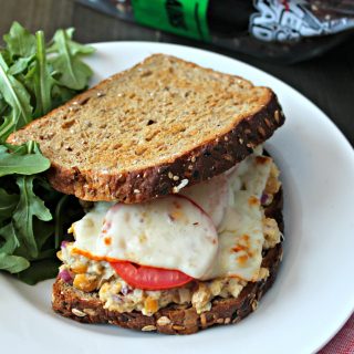 Chickpea Tuna Melt Sandwich! This vegetarian version of the classic diner sandwich makes a fantastic, protein-filled lunch. Made with mashed chickpeas and topped with gooey cheese, no one will miss the tuna in this clever, satisfying knock-off.