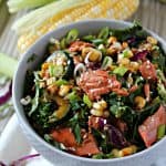 Asian-Inspired Grilled Salmon, Corn & Cucumber Salad! The fresh flavors of grilled summer corn and salmon pair perfectly with cool, crisp cucumber and crunchy slaw mix. A sweet and salty vinaigrette brings this satisfying salad together.
