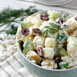 Tzatziki Potato Salad with Kalamata Olives! A fresh, lighter take on a summer favorite, this potato salad features flavors found in tzatziki, a Mediterranean yogurt-based sauce that's often served as a dip or in accompaniment to grilled meats. Salty Kalamata olives and feta cheese give the classic summertime side dish a new spin that will keep everyone coming back for more. 