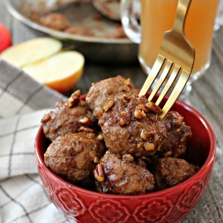 Cider Glazed Turkey Apple Meatballs! Shredded apple keeps these easy meatballs juicy & flavorful. Tossed in a sweet cider glaze, they make a great fall party appetizer or accompaniment to rice or quinoa for a quick dinner. 