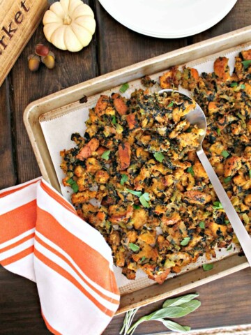 Vegetarian Sheet Pan Stuffing! If you've got a family who fights over the crispy parts of the Thanksgiving stuffing, this recipe will ensure everyone gets what they want! Baking on a sheet pan creates extra texture on this wonderful {vegetarian!} twist on a beloved holiday recipe. 