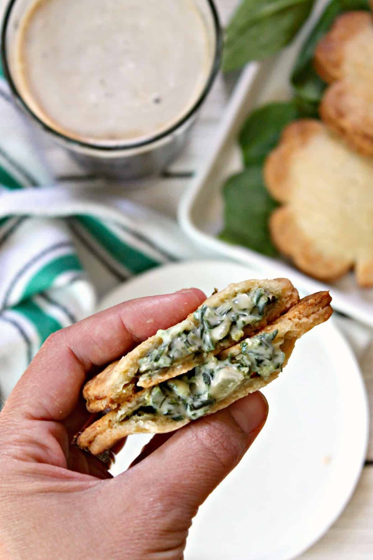 Paddy Pockets - Filled shamrock hand pies! These easy, festive St. Patrick's Day appetizers will outshine the pot of gold at the end of the rainbow! Shamrock-shaped "hot pockets" stuffed with your favorite fillings are a perfect addition to your March menus.