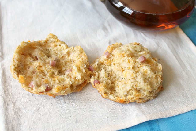 Ham & Cheddar Scones! With a flaky, buttery crust on the outside and soft, pillowy middle, these savory scones are dainty in demeanor but bold in flavor! A great way to use up leftover Easter ham or a wonderful bite to serve for showers or Mother's Day.