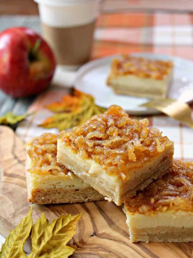 Apple Custard Bars! The autumnal answer to lemon bars, these Apple Custard bars consist of sweet and creamy apple cider-infused custard atop a brown sugar shortcrust, then smothered in a spiced apple topping.
