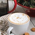 Fluffernutter Latte! This sweet, creamy homemade latte is perfect for enjoying when the temperatures drop. Made with a simple peanut butter syrup and topped off with a swirl of marshmallow fluff, you'll find yourself skipping the coffee shops and making this unique beverage at home. 