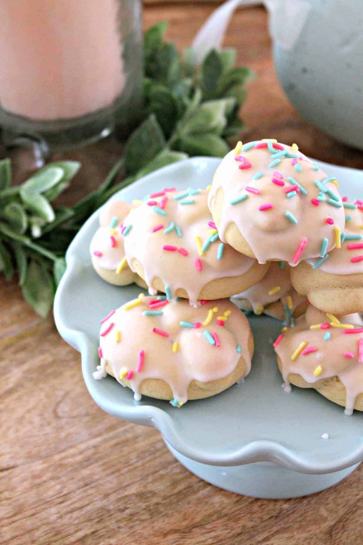 Close up of Italian Easter Cookies on a light blue platter.