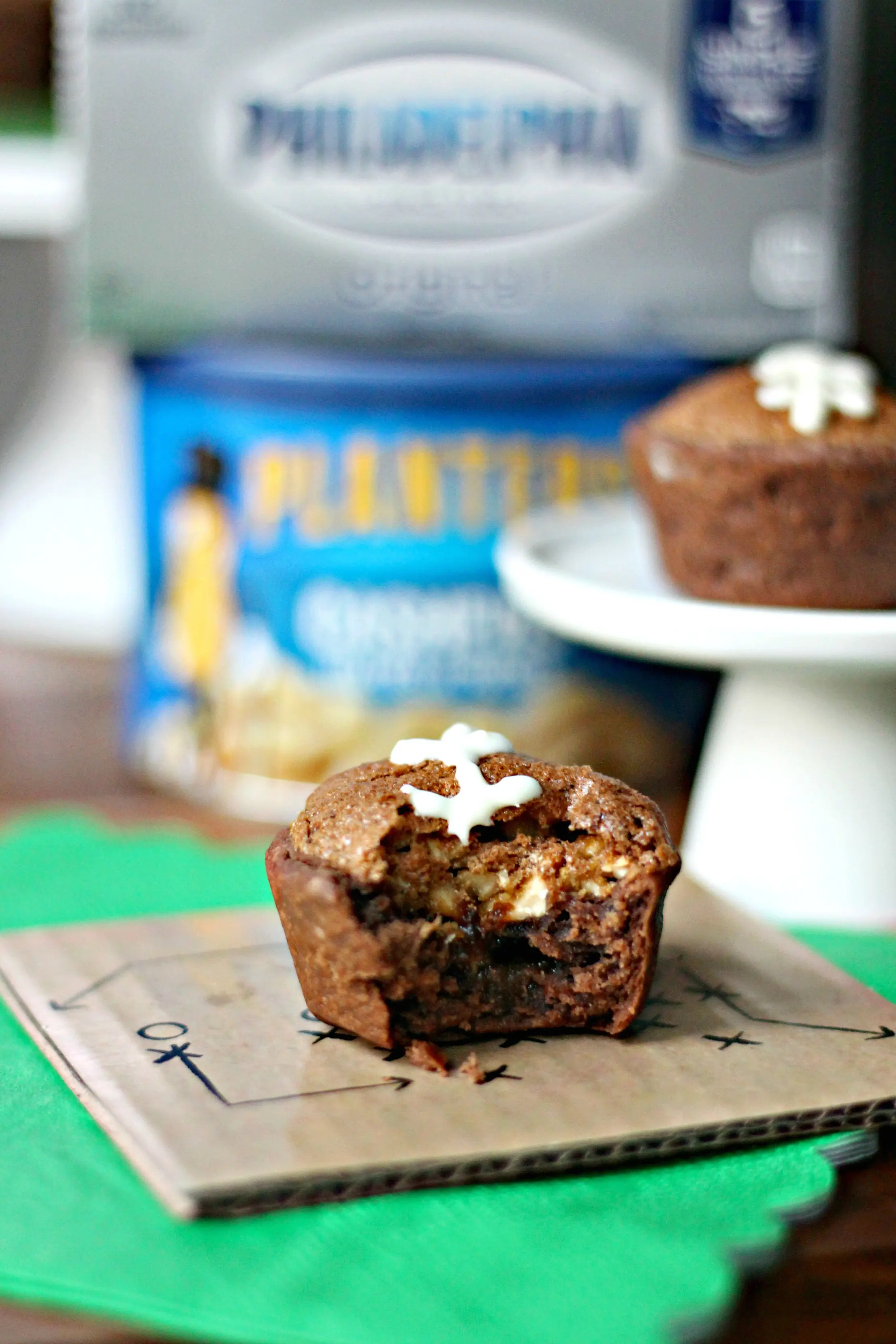 Close up of Football Pie Cookie Cups with bite taken out of it.