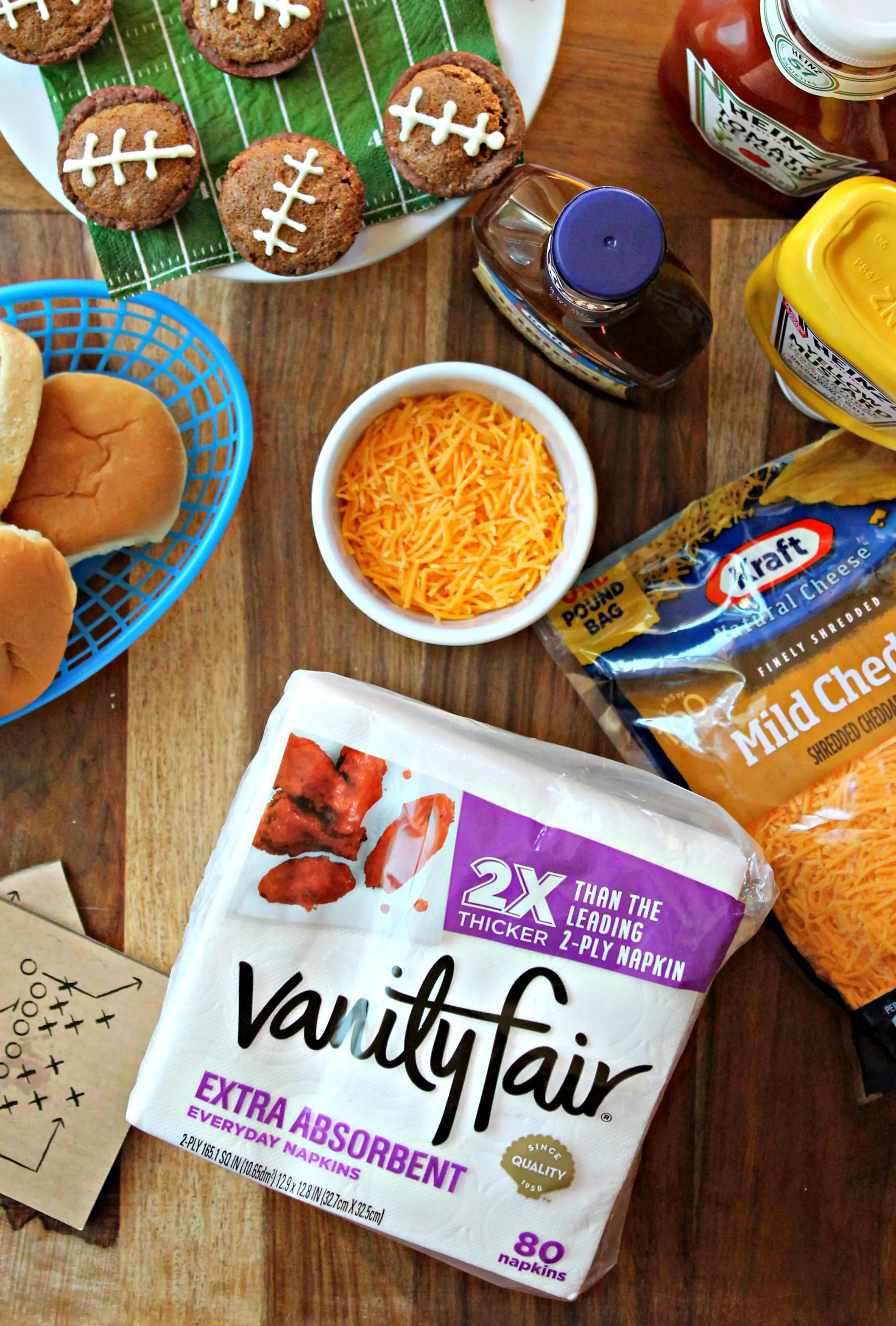 Overhead shot of Vanity Fair paper towels on table with football snack supplies.