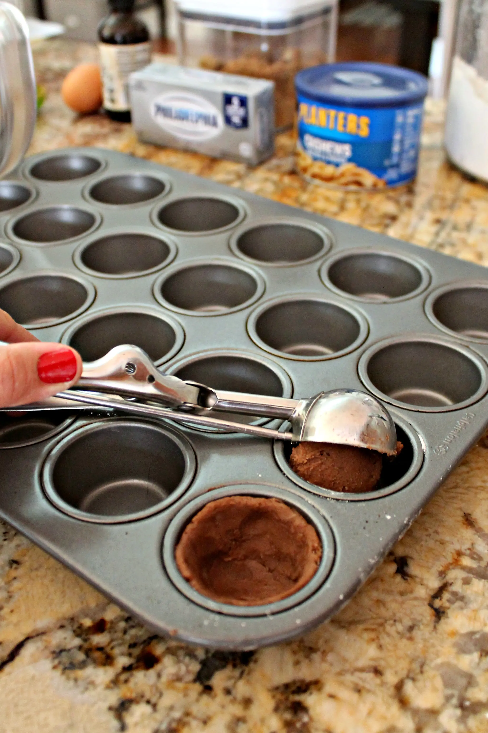 Process shot of making dough shells for Football Pie Cookie Cups.