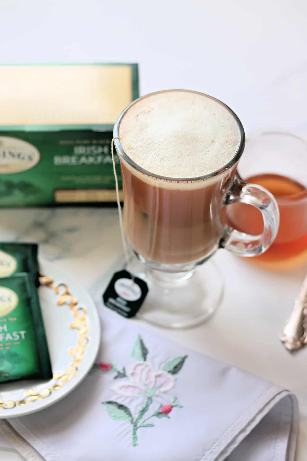 Dublin Fog tea latte in a glass mug.