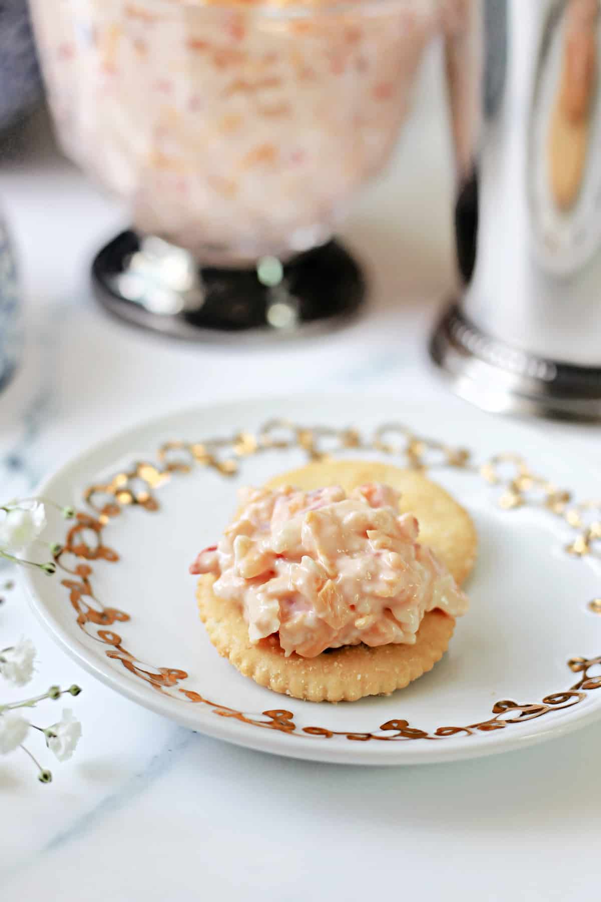 Pimento cheese spread on a cracker.