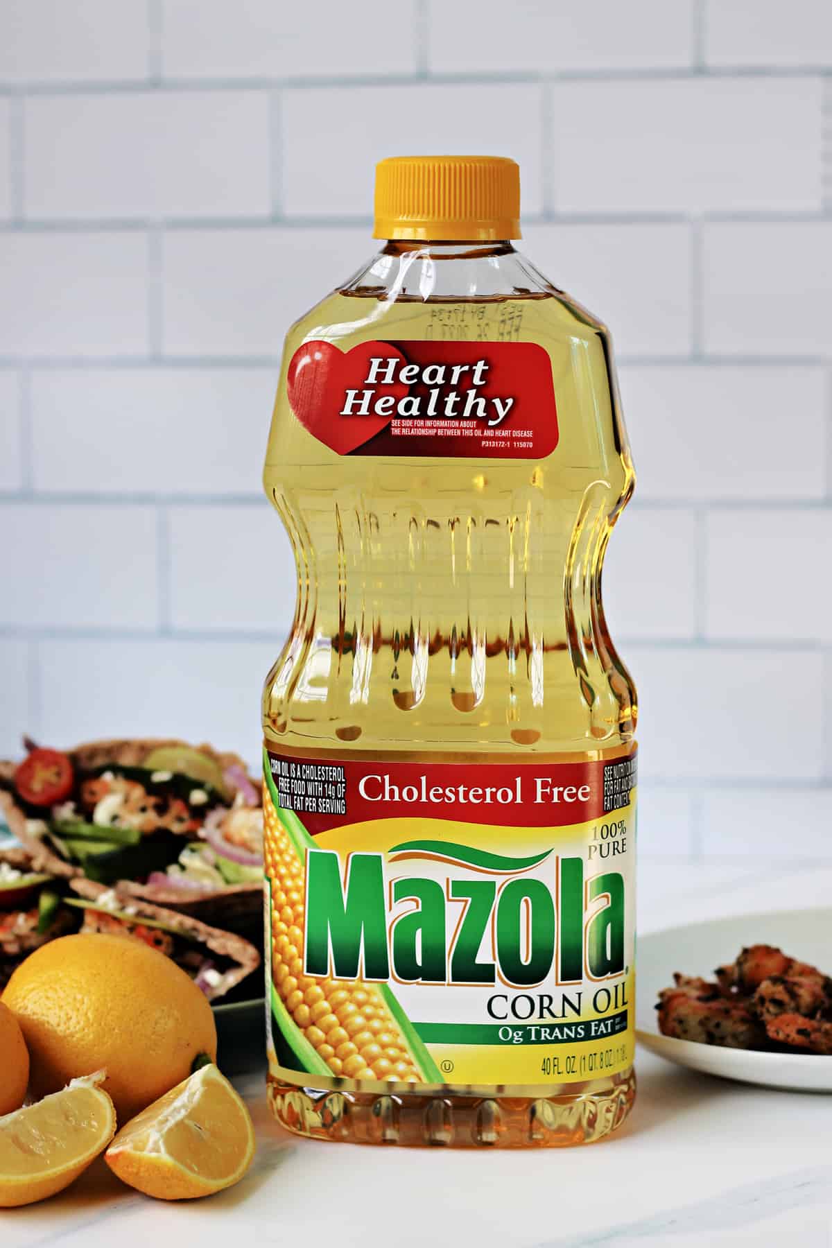 Mazola Corn Oil next to Grilled Greek Shrimp Pitas.