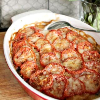 Provencal Potato Gratin in a red oval baking dish.