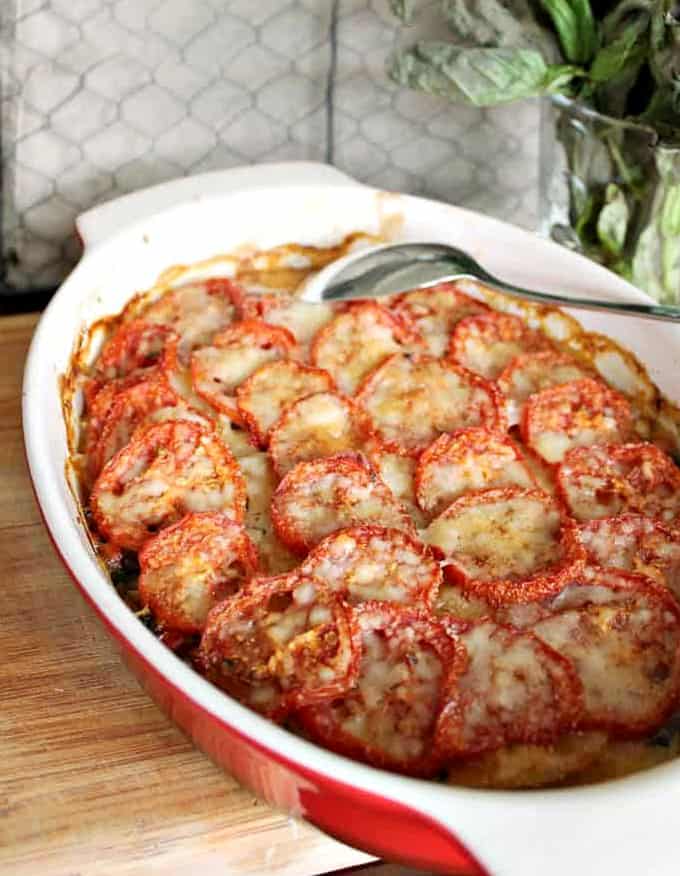 Provencal Potato Gratin in a red oval baking dish.