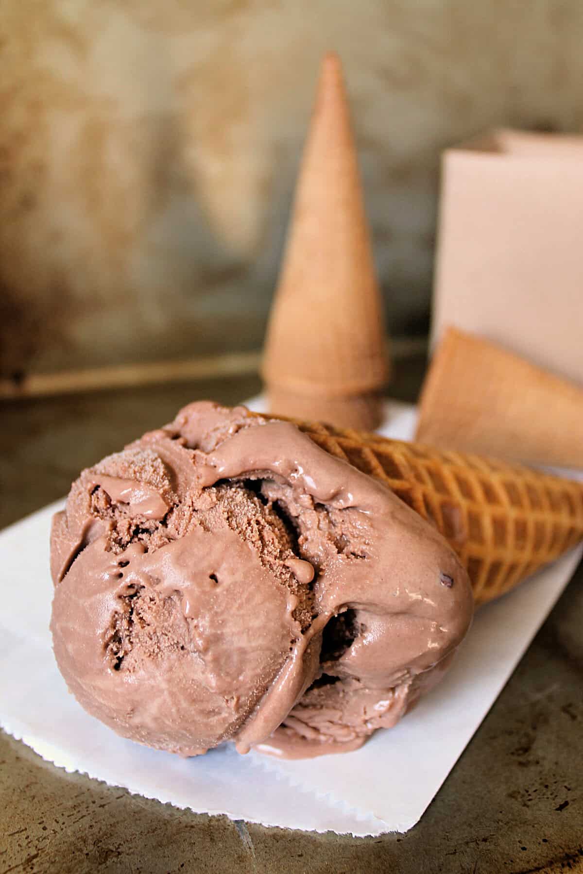 A scoop of Nutella Ice Cream in a cone.
