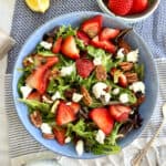 Strawberry & Goat Cheese Salad in a blue bowl.